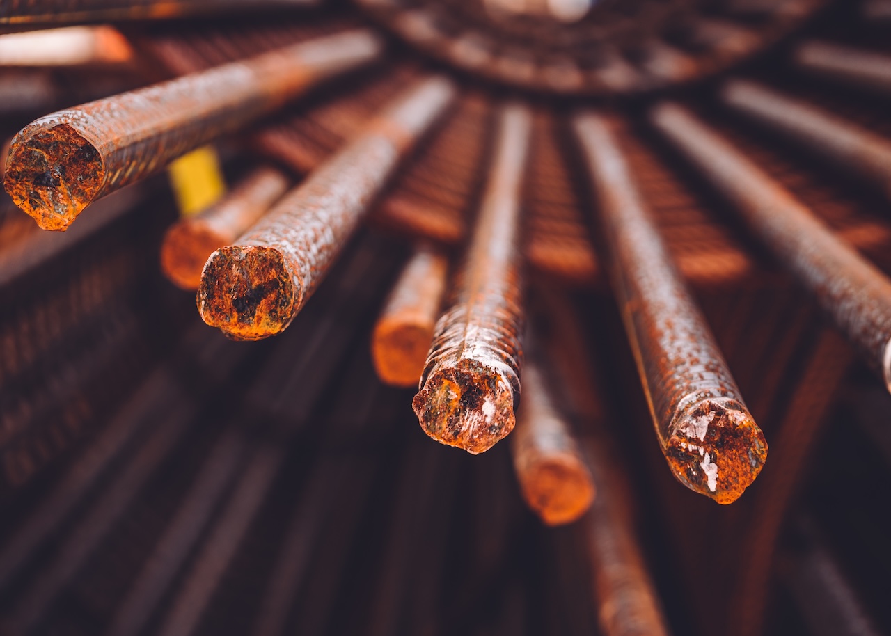 A closeup shot of rusty iron rods on a construction site